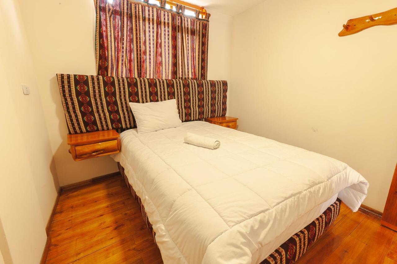 Los Ponchos Inn Apartasuite โอตาวาโล ภายนอก รูปภาพ