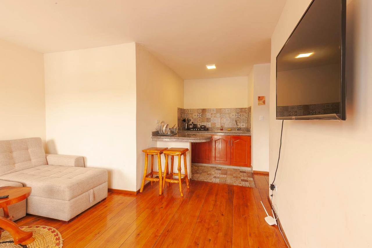 Los Ponchos Inn Apartasuite โอตาวาโล ภายนอก รูปภาพ