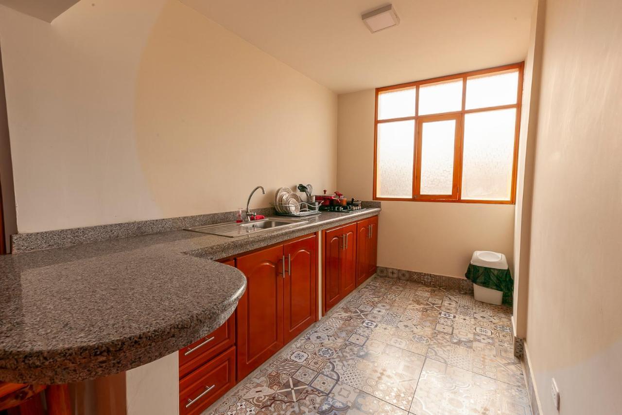 Los Ponchos Inn Apartasuite โอตาวาโล ภายนอก รูปภาพ