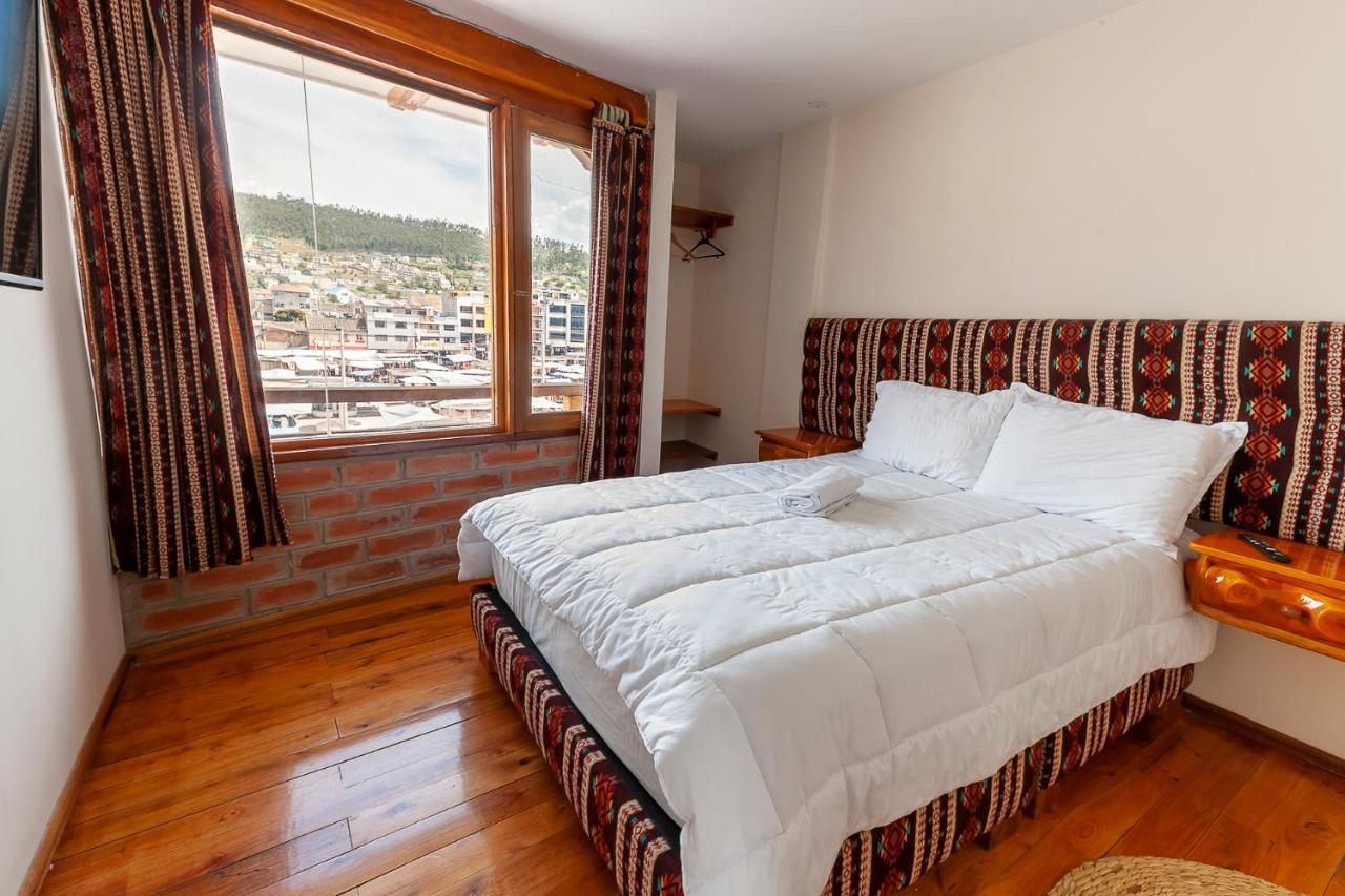 Los Ponchos Inn Apartasuite โอตาวาโล ภายนอก รูปภาพ