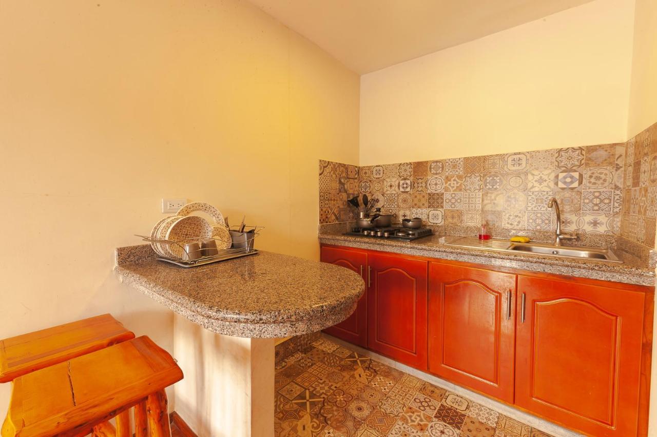 Los Ponchos Inn Apartasuite โอตาวาโล ภายนอก รูปภาพ